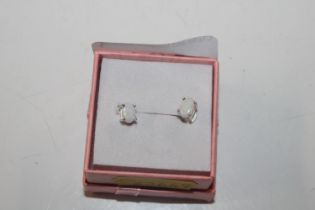 A pair of sterling silver and opal stud ear-rings