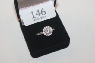 A 925 silver and cubic zirconia cluster ring