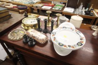 A quantity of candlesticks, Habitat porthole style clock etc