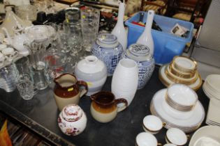 A pair of blue and white ginger jars AF; a pair of