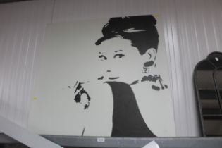 A print on canvas depicting Audrey Hepburn