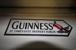 A painted cast iron sign for Guinness (159)