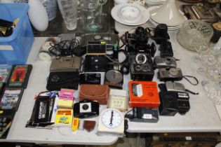 A quantity of various cameras and accessories to i