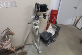 A vintage Devon camera on tripod