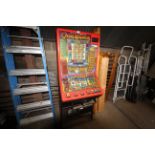 A Cash Raider slot machine (sold as a collectors i