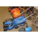 A Hyundai petrol rotary self propelled rotary lawn