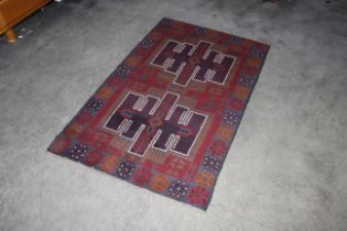 An approx. 5'3" x 3'3" Bolochi rug