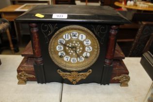 A marble effect cased two hole mantle clock with k