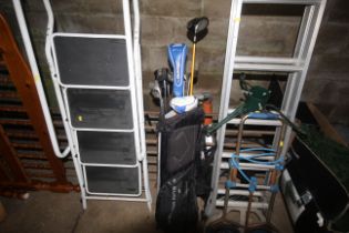 A Sun Mountain golf bag and contents of clubs to i