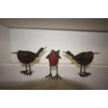 Three metal robin ornaments (113)