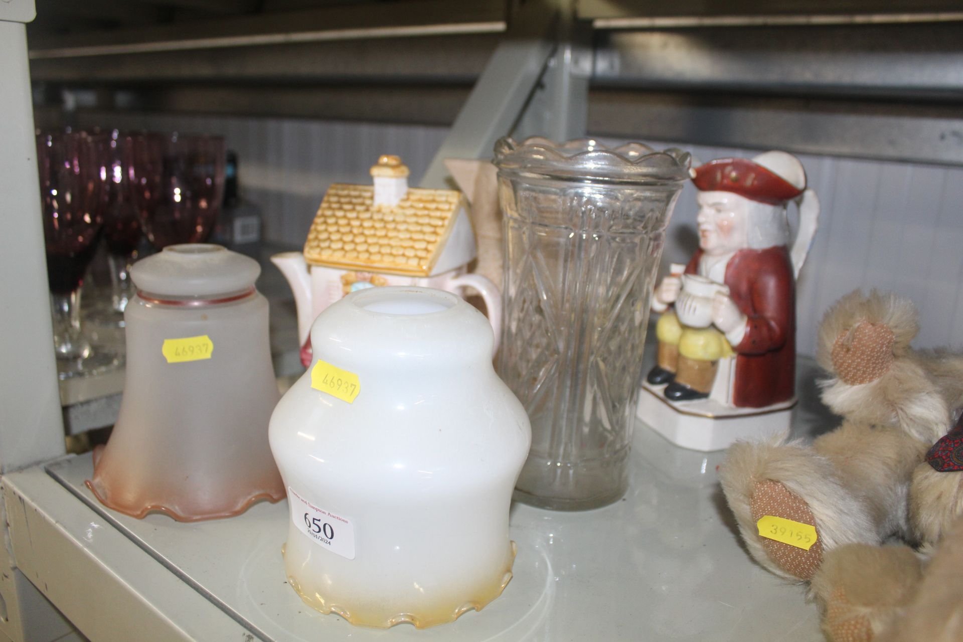 A novelty teapot, character jug, two glass light s