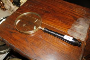 A reproduction magnifying glass