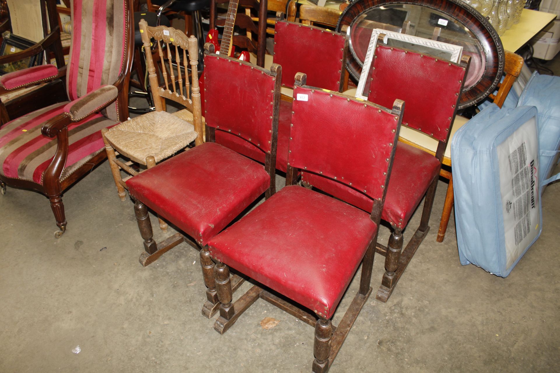 Four oak framed dining chairs