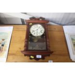 A mahogany cased wall clock