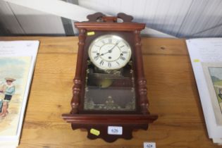 A mahogany cased wall clock