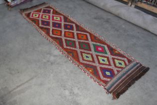 An approx. 9'2" x 2'6" Old Suzni runner