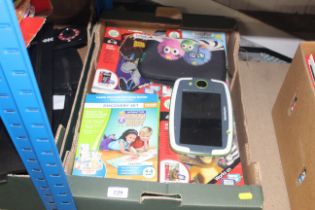 A box of Leap Pad and other games