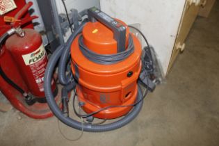 A VAX vacuum cleaner with accessories