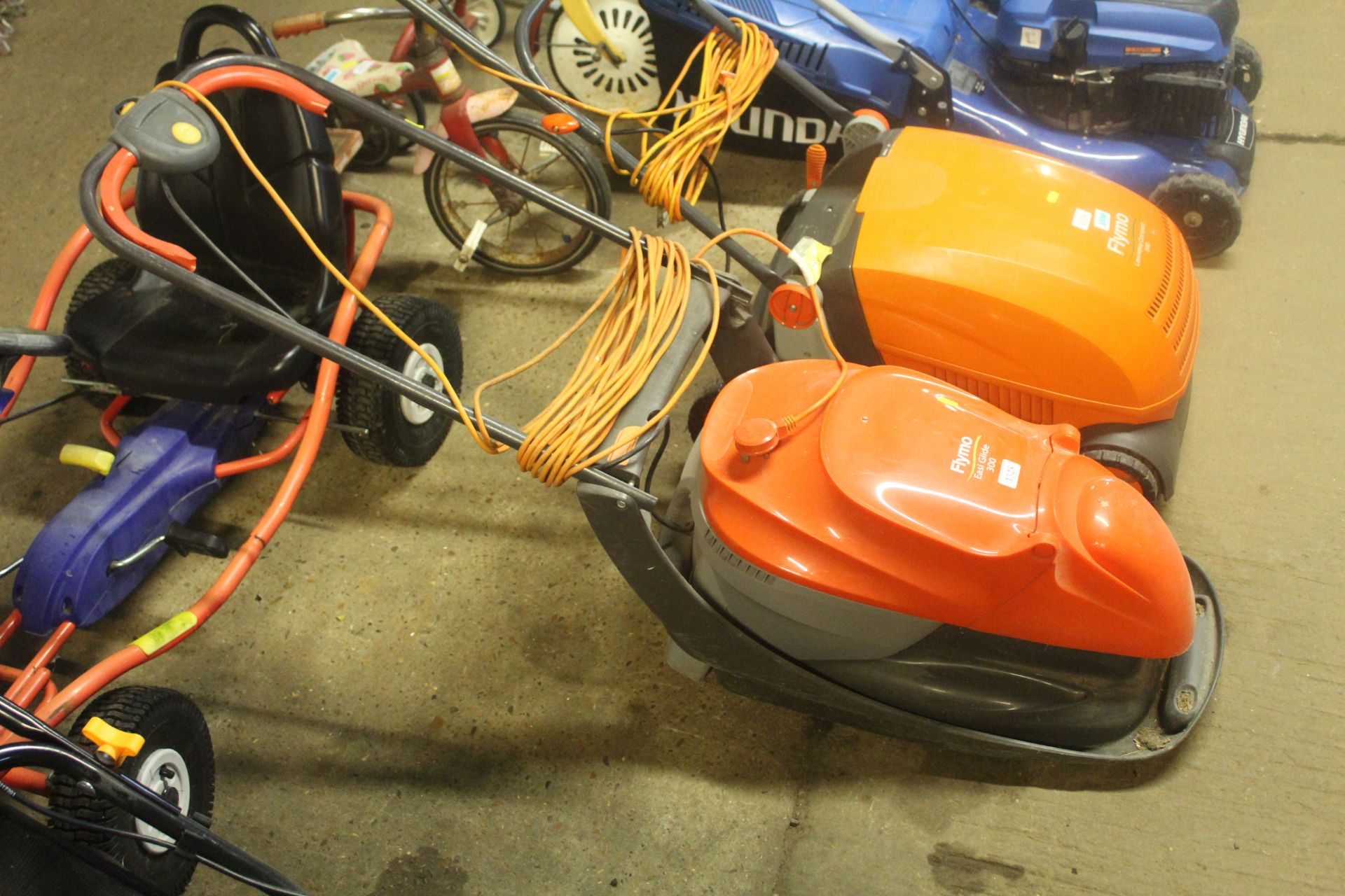 An electric Flymo EasiGlide 300 hover mower