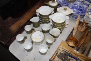 A quantity of Poole pottery; tea and dinnerware