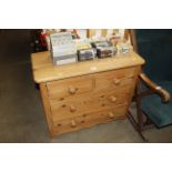 A stripped pine chest fitted two short over two lo