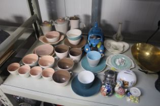 A collection of Poole twin tone teaware, novelty t