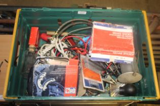 A box containing various items to include brake s