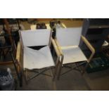 Two wooden framed folding directors style chairs