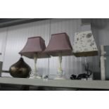 A pair of table lamps with shades and two other la