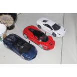 Three die cast model super cars