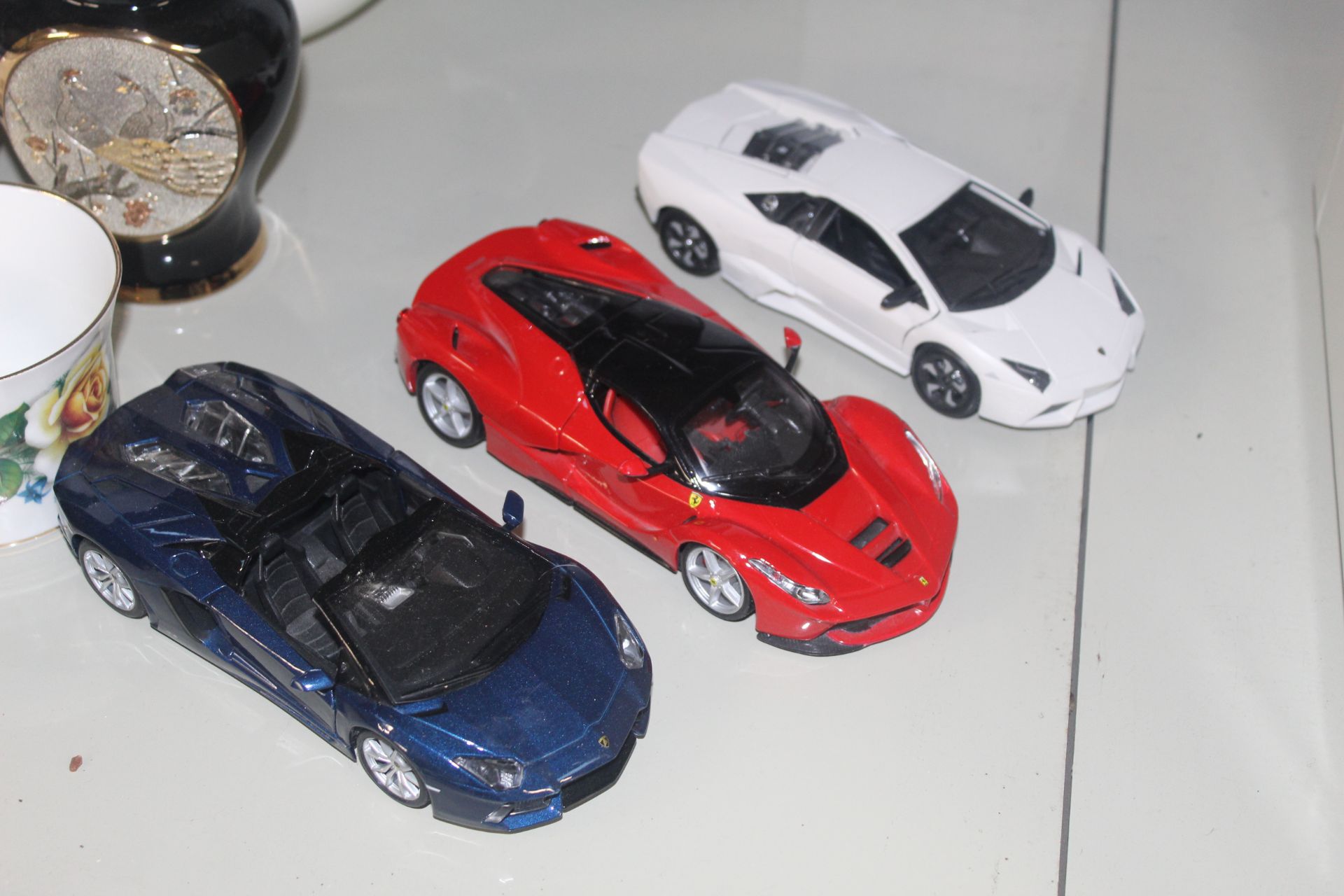 Three die cast model super cars