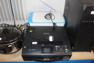 An HP Deskjet printer and a Brother printer