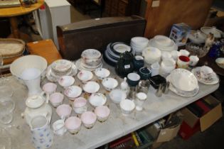 A large quantity of various tea and dinnerware to