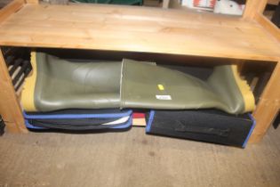 Two photo album cases, a suit bag and a pair of Du