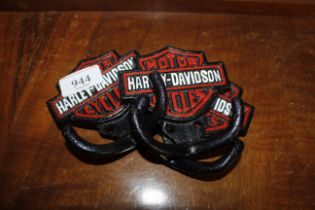 A set of three reproduction Harley Davison coat ho