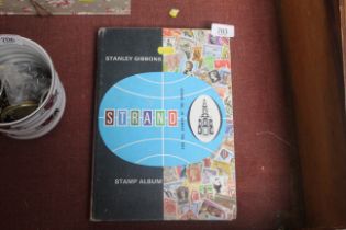 A Stanley Gibbons Strand stamp album