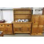 A carved oak dresser