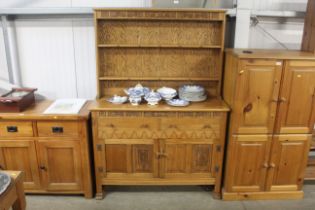 A carved oak dresser