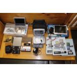 A collection of DVD players, Amstrad software, sca