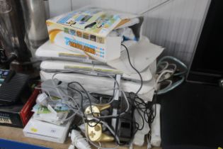 A Nintendo Wii console with various accessories