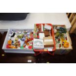 Three boxes of various children's toys and dolls h