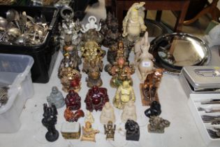 A quantity of Buddha and other ornaments