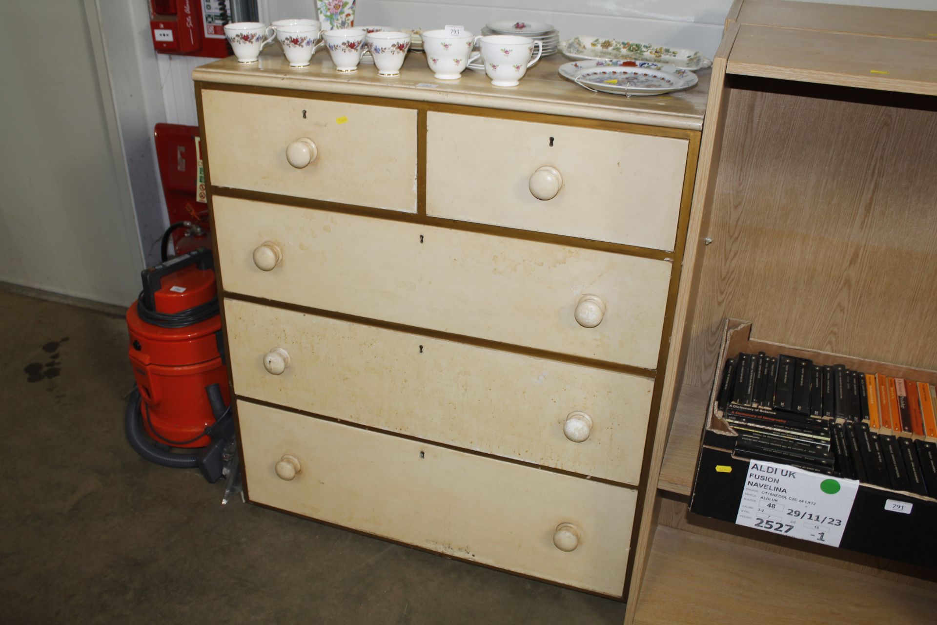 A painted pine chest fitted two short over three l
