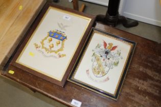 Two framed and glazed hand painted crests