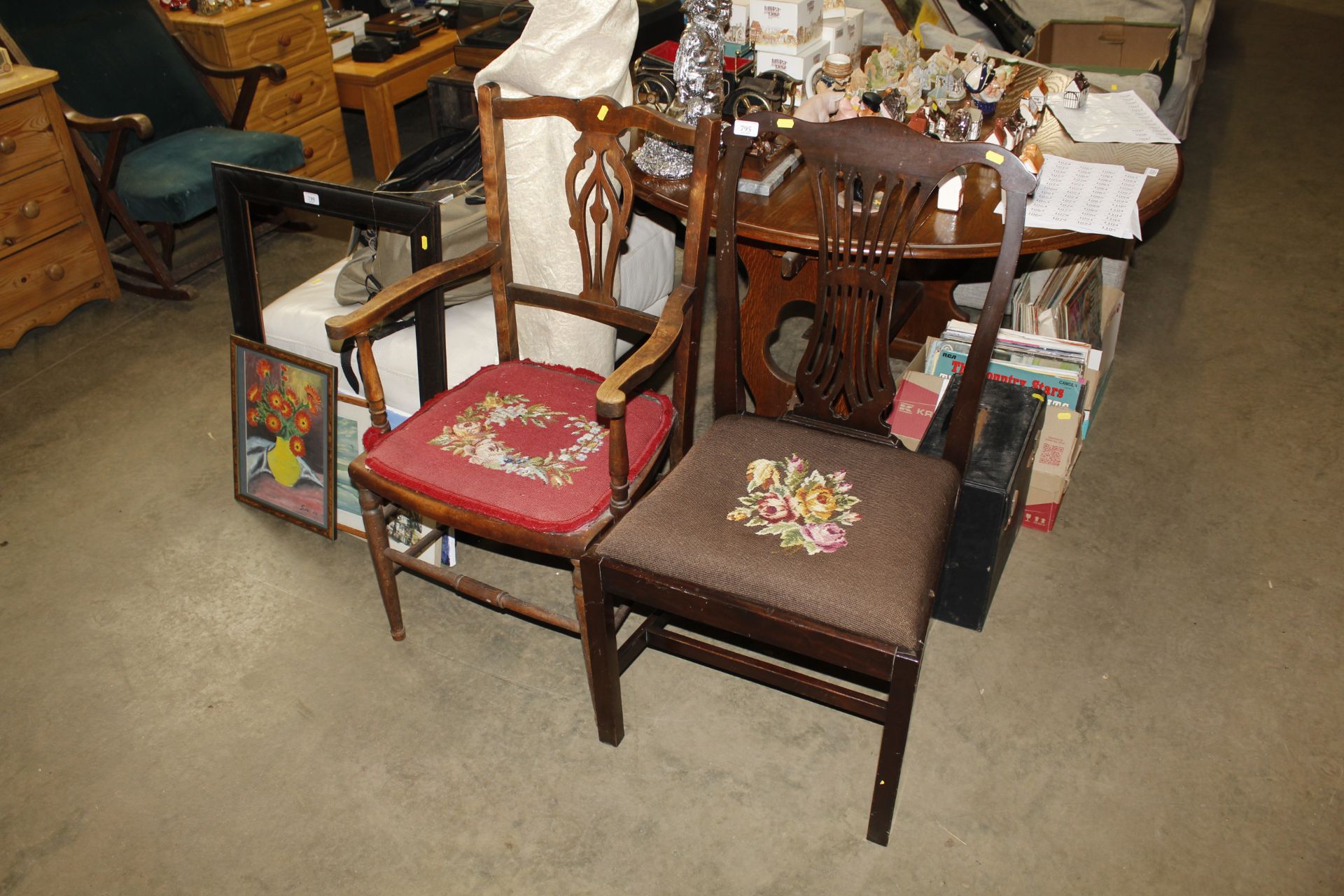 An Edwardian elbow chair and mahogany dining chair