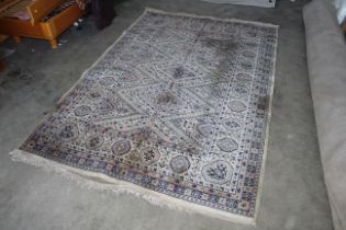An approx. 9'2" x 6' patterned rug AF