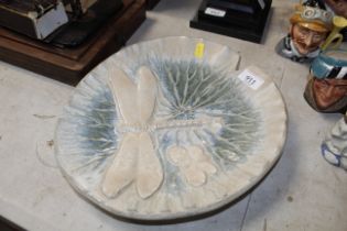 A Studio pottery dish in the form of a lily pad de