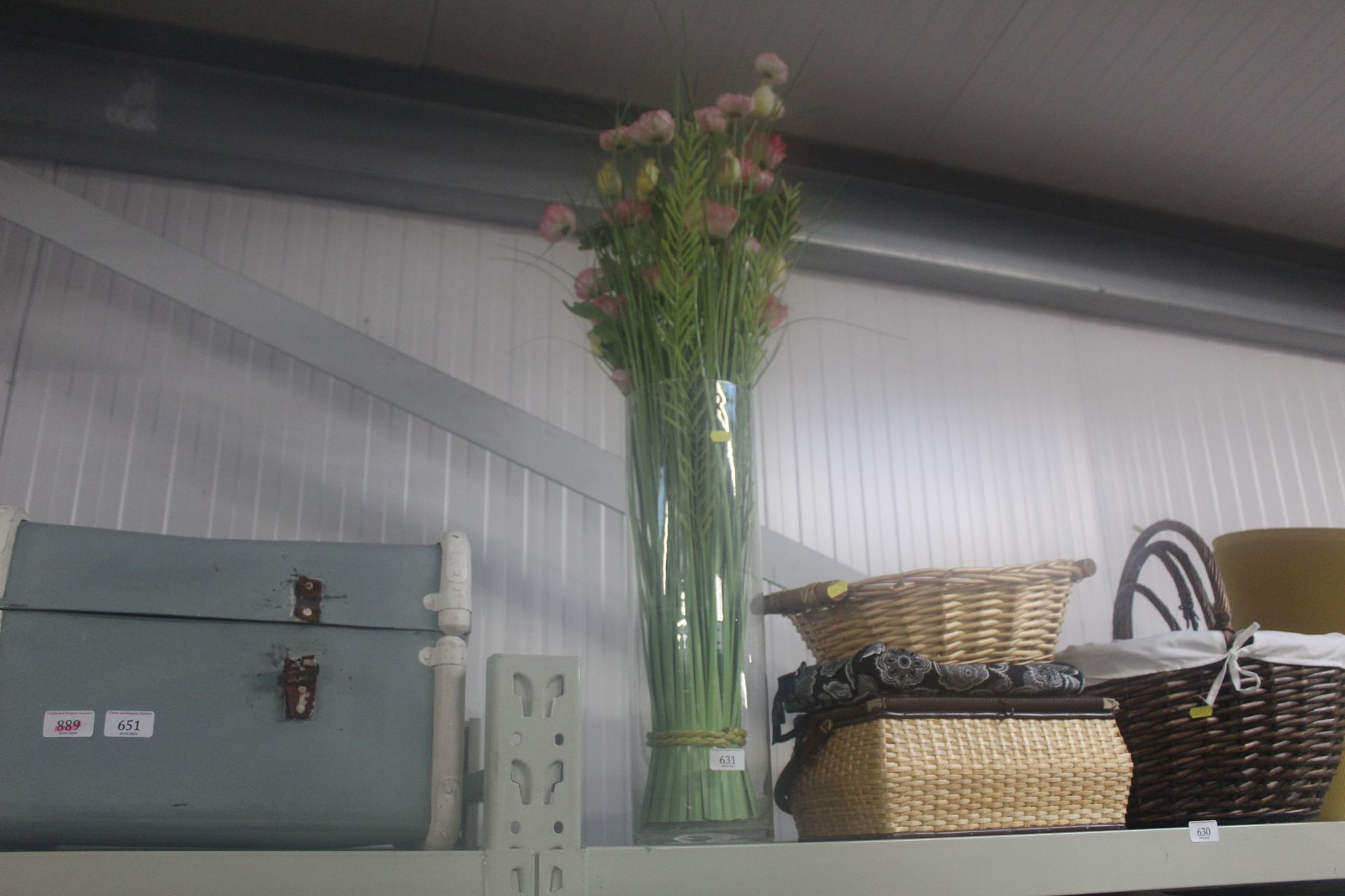 A vase of artificial flowers