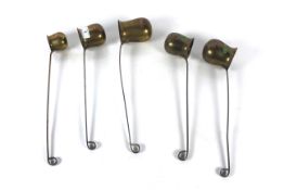 Five various brass spirit measuring ladles includi