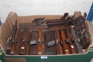 A box of various sized moulding planes